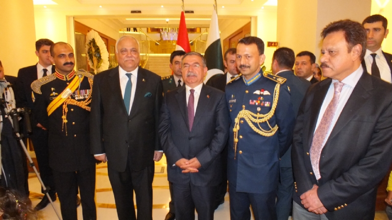 turkish defence minister with pakistan embassy school children